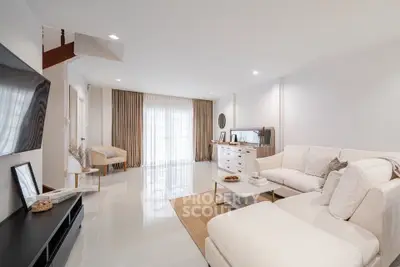 Spacious modern living room with elegant decor and natural light