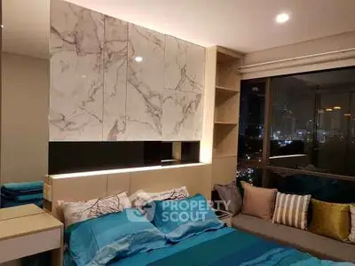 Luxurious bedroom with modern marble accents and city view