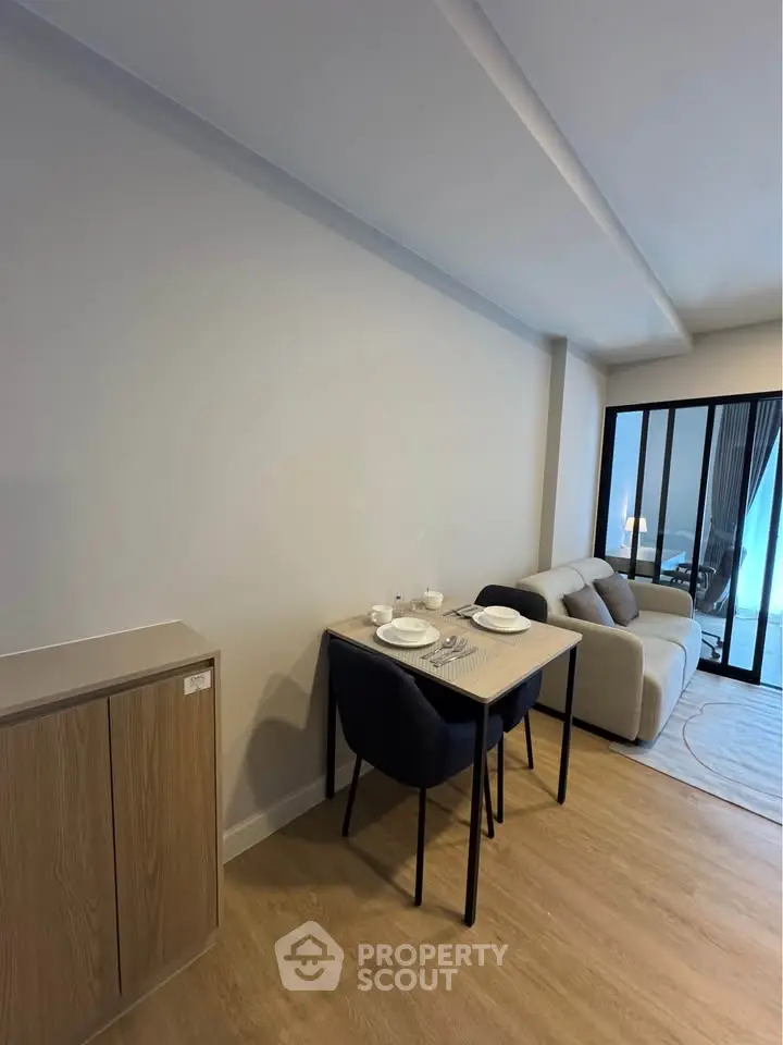 Modern living room with dining area and stylish furniture