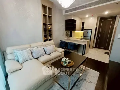 Modern living room with open kitchen and elegant decor