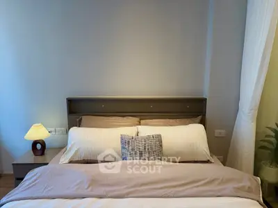 Cozy bedroom with modern decor and soft lighting