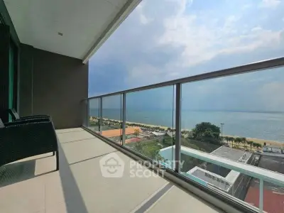Spacious balcony with stunning ocean view, perfect for relaxation and enjoying the sea breeze.
