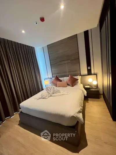 Luxurious bedroom with elegant decor and cozy lighting