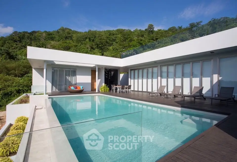 Luxurious modern villa with stunning pool and scenic hillside view