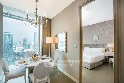 Luxurious dining area with city view and elegant bedroom in modern apartment