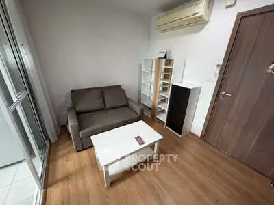 Cozy living room with modern furniture and air conditioning