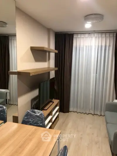 Modern living room with sleek furniture and natural light