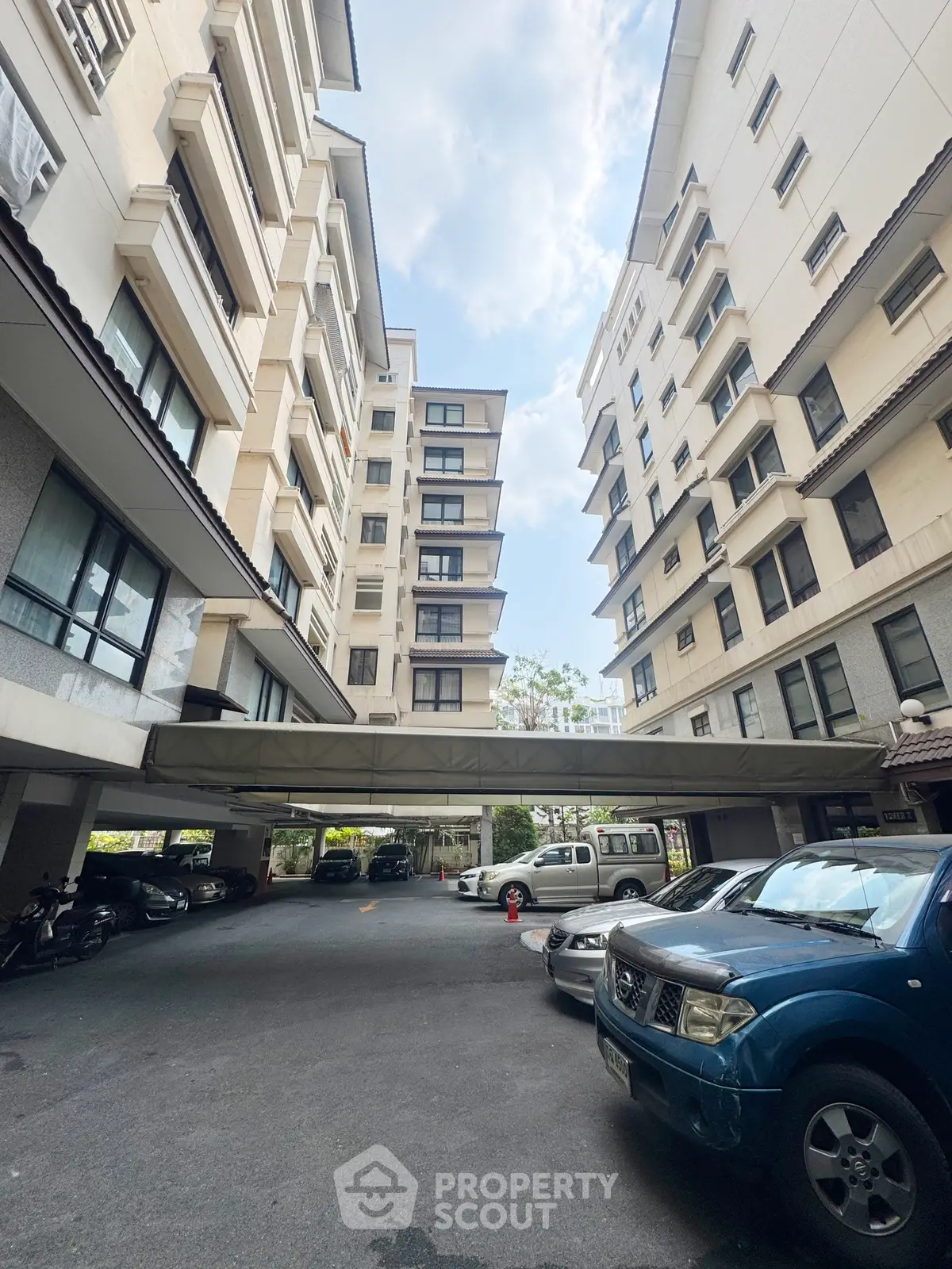 Spacious apartment building with ample parking and modern design