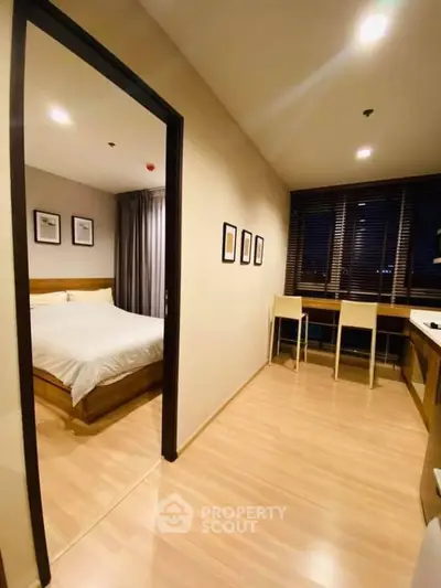 Modern apartment interior with cozy bedroom and stylish study area