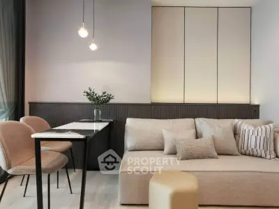 Modern living room with stylish furniture and elegant lighting