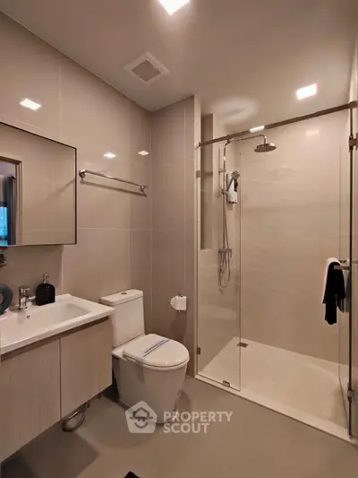 Modern bathroom with sleek shower and elegant fixtures