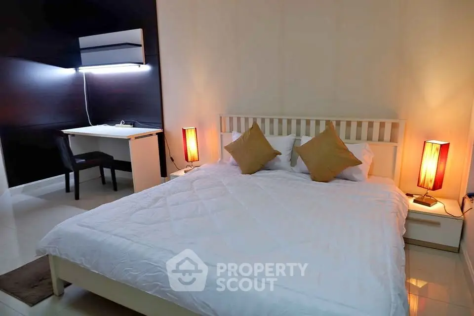 Cozy bedroom with modern decor and ambient lighting