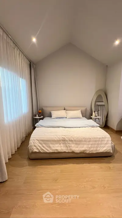 Modern bedroom with minimalist design and cozy ambiance