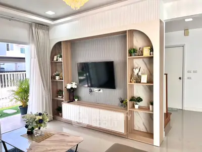 Modern living room with stylish TV unit and elegant decor