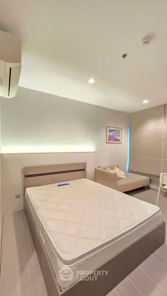 Modern bedroom with minimalist design and cozy lighting