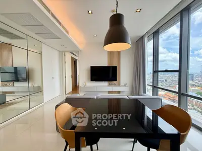 Modern living room with panoramic city view and stylish furniture