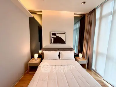 Modern bedroom with stylish decor and natural lighting