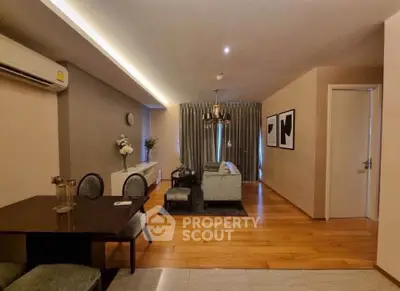 Spacious modern living room with elegant decor and wooden flooring