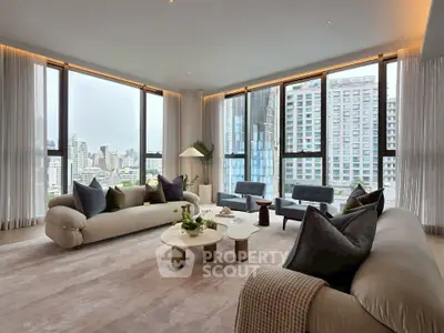 Luxurious living room with panoramic city views and elegant modern furnishings.