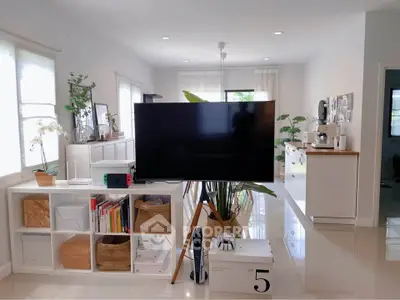 Modern living room with sleek TV setup and stylish decor