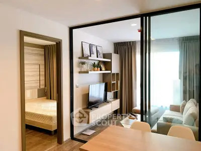 Modern living room with stylish decor and cozy bedroom view