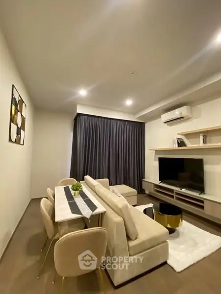 Modern living room with elegant decor and cozy seating area