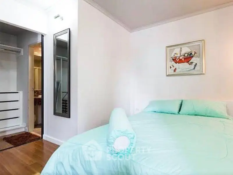 Cozy bedroom with modern decor and soft lighting