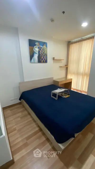 Cozy bedroom with modern decor and natural light