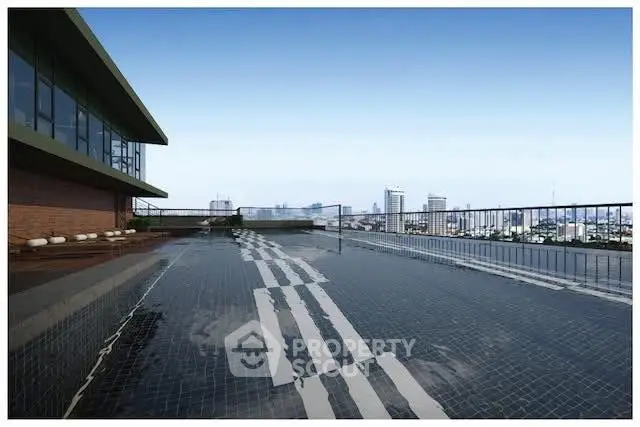 Stunning rooftop pool with panoramic city skyline view, perfect for luxury urban living.