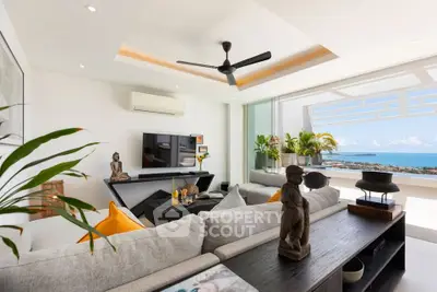 Luxurious living room with panoramic ocean view and modern decor