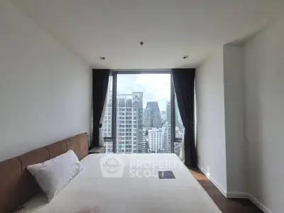 Modern bedroom with stunning city view from large window, featuring minimalist design and cozy ambiance.