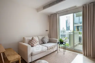 Modern living room with city view and balcony access