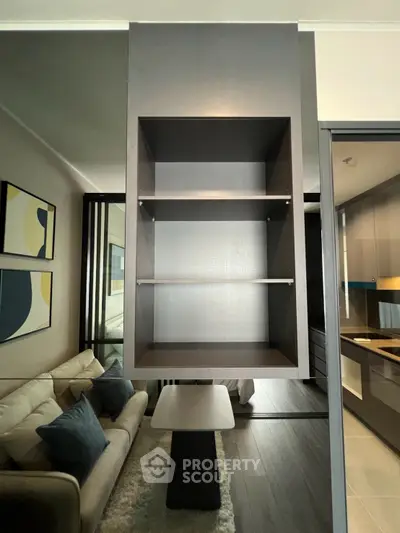 Modern living room with stylish shelving and cozy seating area