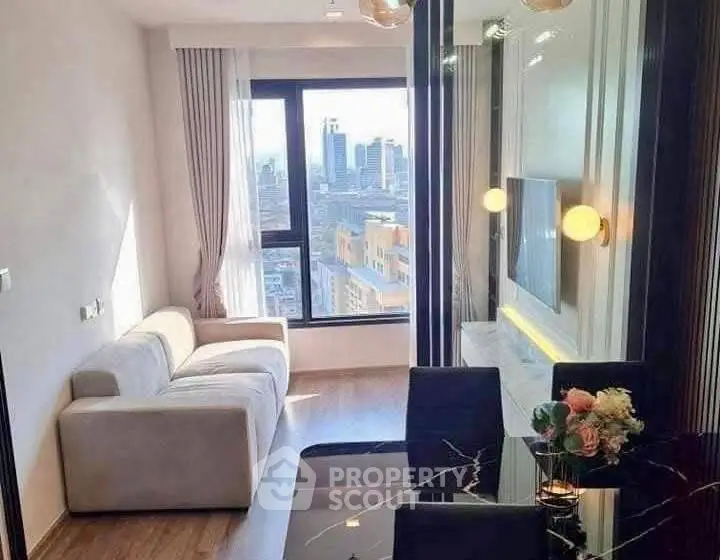 Modern living room with city view, stylish furniture, and elegant decor