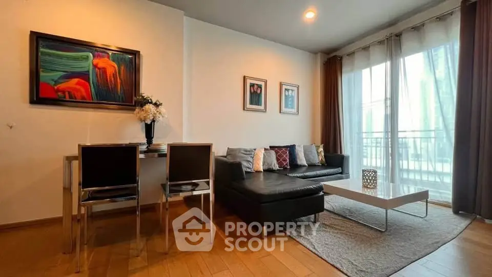 Stylish living room with modern decor and large windows for natural light.