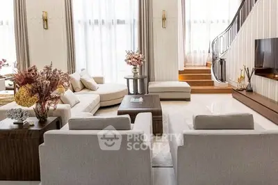 Luxurious modern living room with elegant decor and natural light