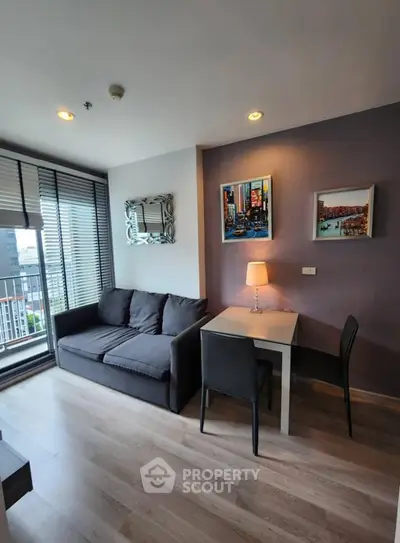 Modern living room with balcony view and stylish decor