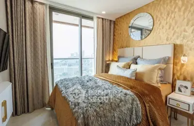 Luxurious bedroom with city view, elegant decor, and plush bedding.