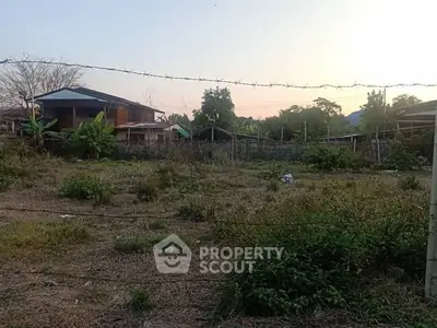 Vacant land with potential for development in a serene neighborhood setting.