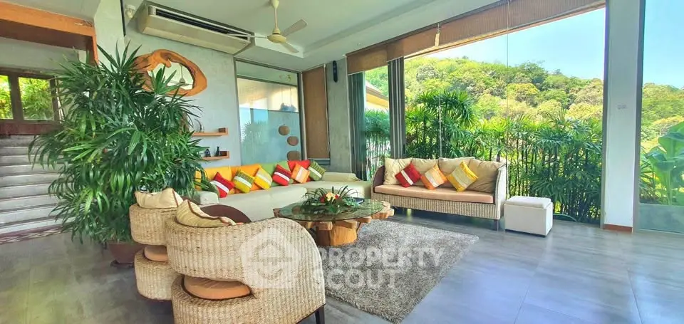 Luxurious living room with panoramic garden view and stylish decor