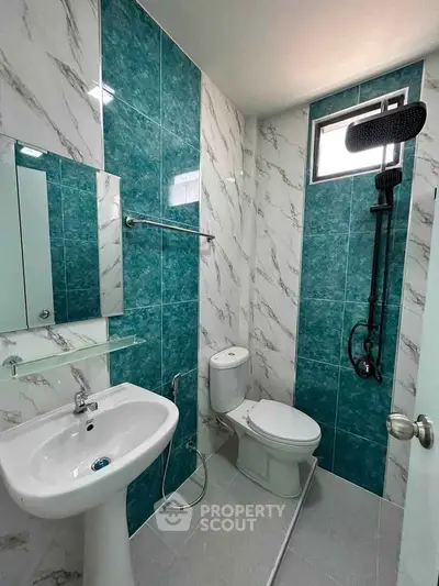 Modern bathroom with stylish tiles and sleek fixtures