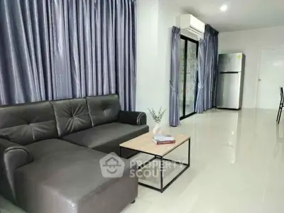 Modern living room with sleek leather sofa and stylish decor