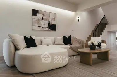Elegant modern living room with plush sofa and stylish decor