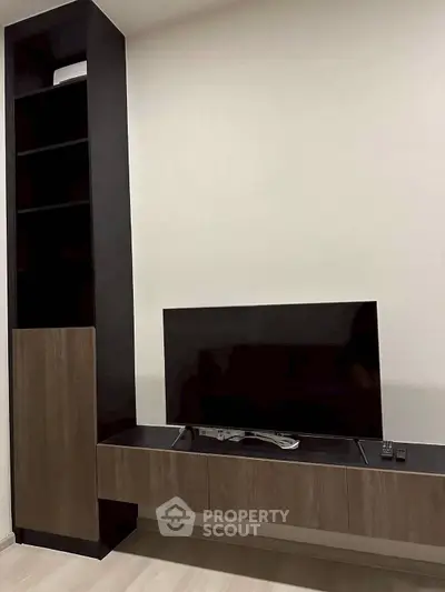 Modern living room with sleek TV unit and minimalist design