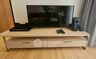 Modern living room with sleek TV stand and entertainment setup