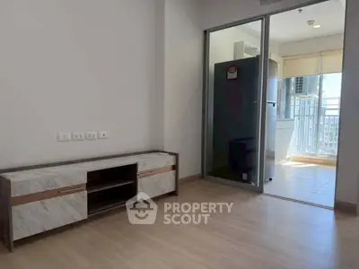 Modern apartment with sleek flooring and balcony access