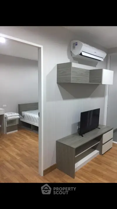 Modern apartment interior with air conditioning and sleek furniture