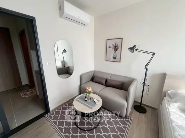 Modern living room with stylish decor and cozy seating area
