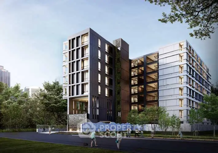 Modern apartment building with sleek design and lush surroundings, ideal for urban living.
