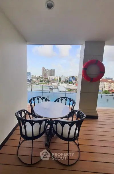 Stunning balcony with city view, perfect for relaxation and enjoying the skyline.